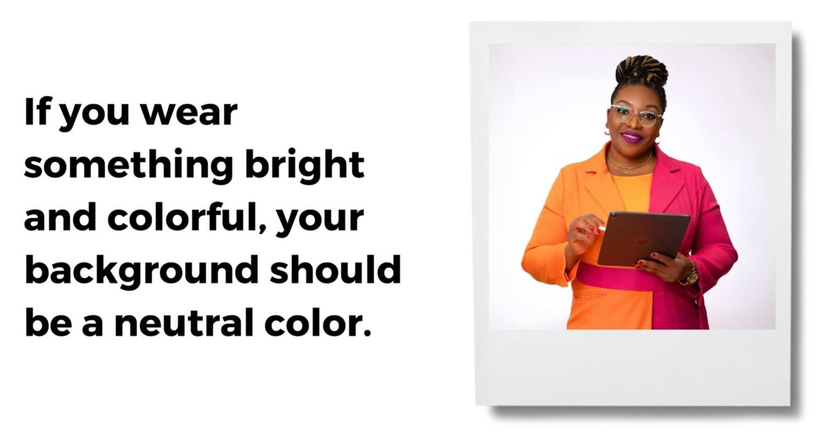 Why You Should Keep Your Headshot Photo Up To Date A Person Wearing A Bright Orange And Pink Outfit Holds A Tablet. The Image Includes Text Suggesting That If You Wear Something Bright And Colorful, The Background Should Be A Neutral Color.