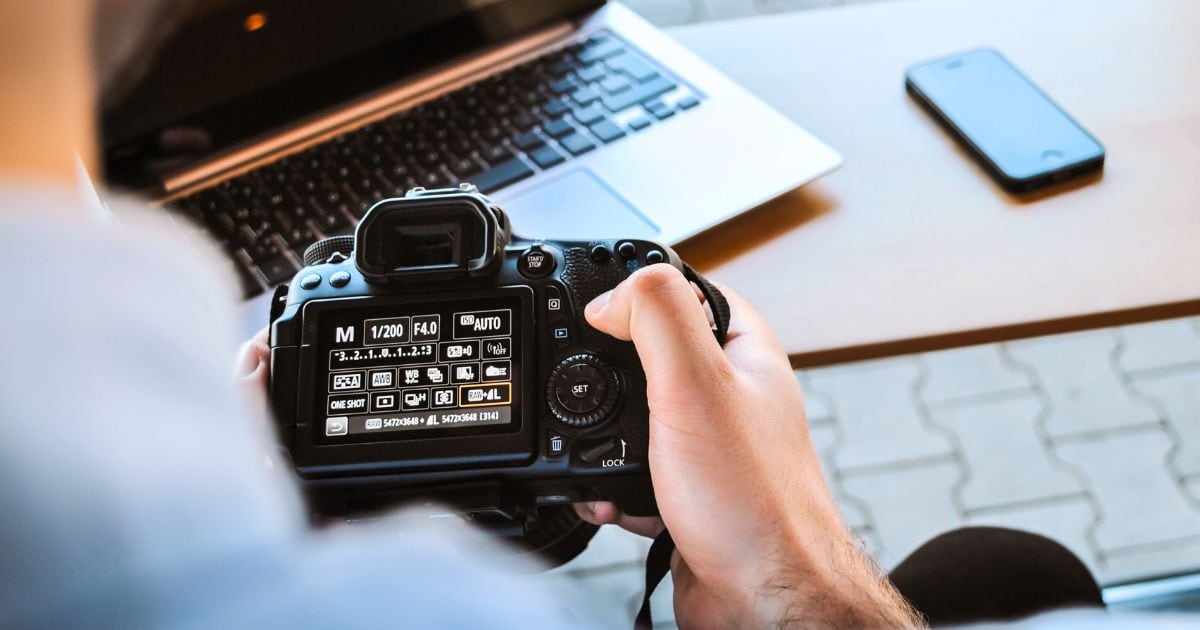 Photography For Beginners (How To Take Pictures Like A Pro) A Beginner Photographer Is Using A Dslr Camera To Capture An Image.