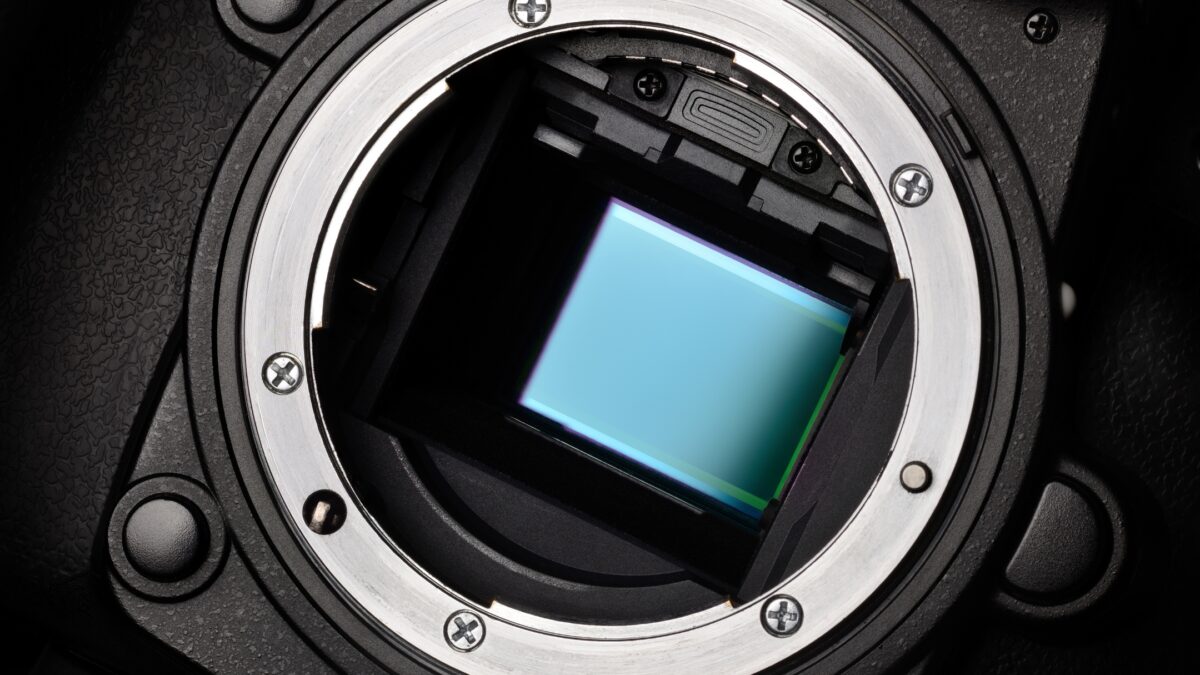 What Is A Camera? Learn The Magic Behind Taking Photos! A Close Up Of A Camera Lens With A Blue Screen, Showcasing The Functionality Of A Camera.