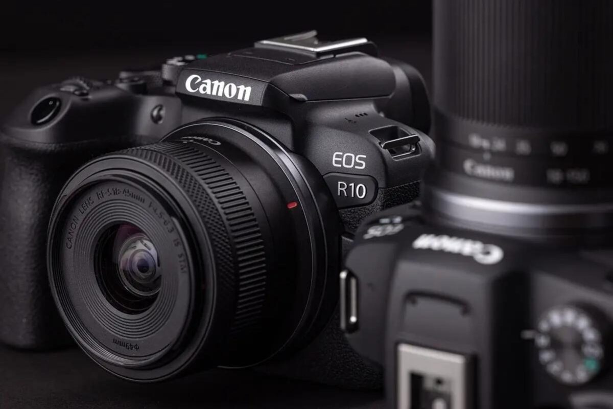 The Best Budget Friendly Cameras For Beginners A Budget-Friendly Canon Eos R10 Camera With A Lens Next To It.
