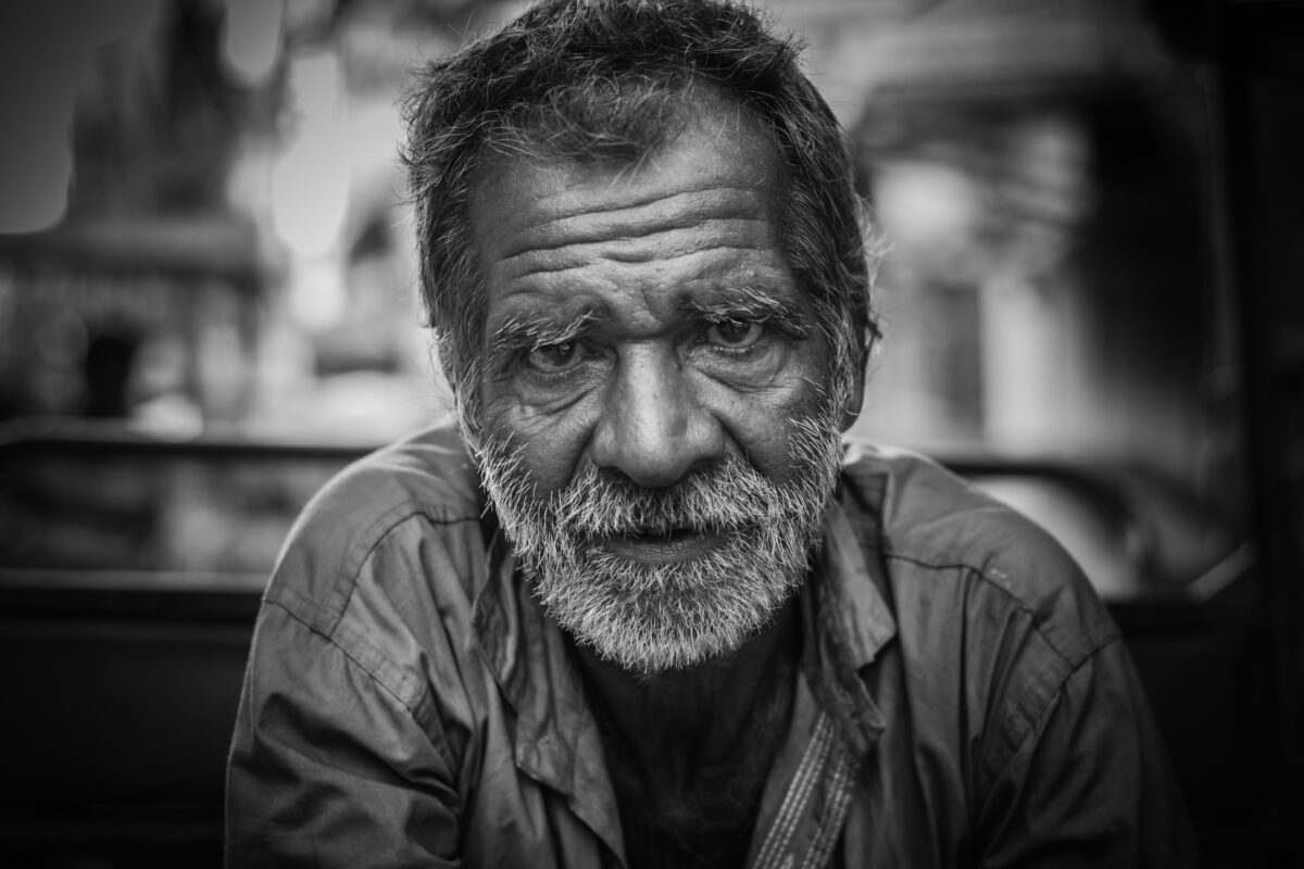 How To Review And Analyze Photos As A New Photographer A Black And White Photo Capturing The Essence Of An Old Man, Showcasing Why Photography Is Important.