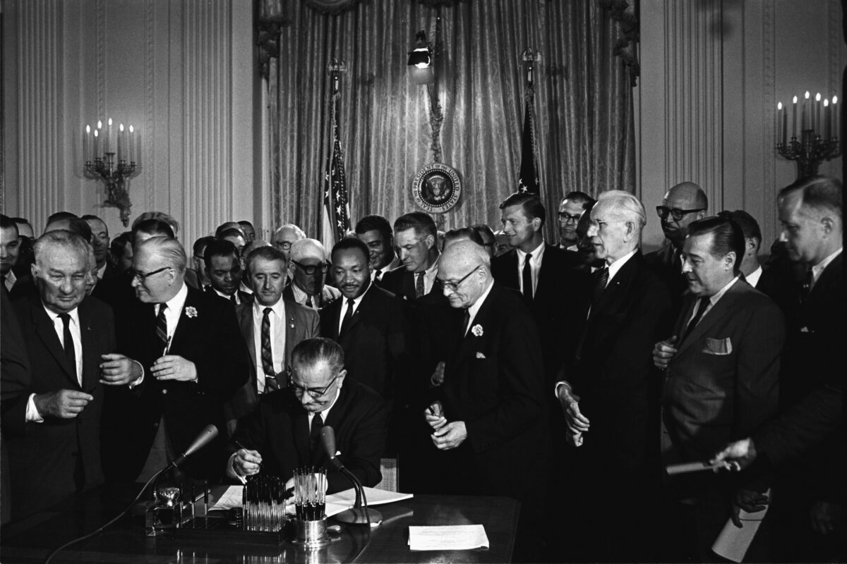 Why Photography Is Important In Business And Life President John F. Kennedy Signing The Civil Rights Bill Highlights Why Photography Is Important.
