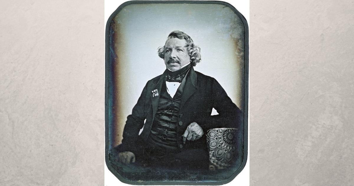 What Is Photography: An Introduction And Quick Guide A Photograph Capturing A Man Seated.