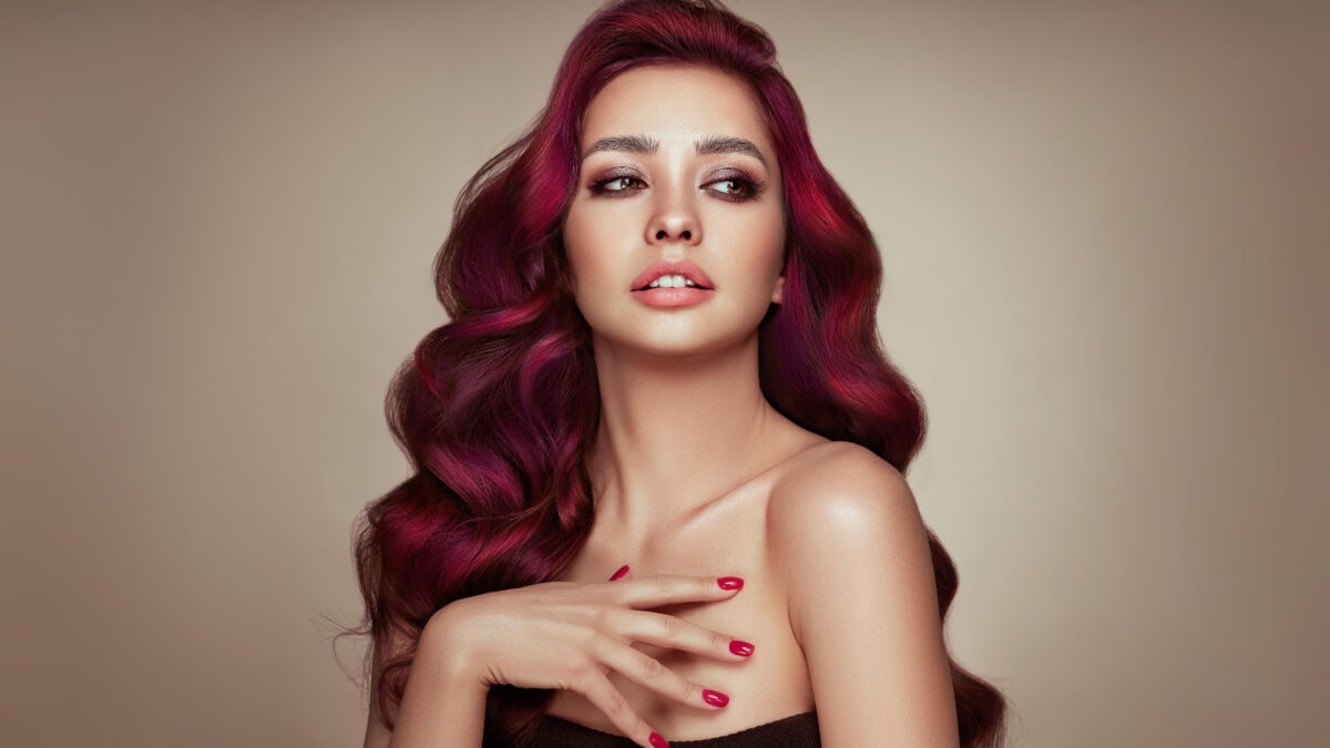 Portrait Photography Tips For Beginners A Stunning Woman With Vibrant Red Hair Posing For A Captivating Portrait Photography Session.
