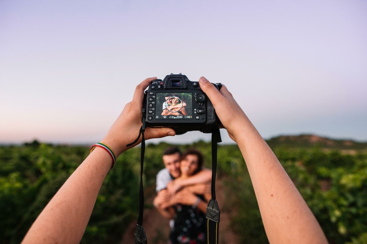 12 Mistakes Photographers Make A Couple Capturing A Picturesque Moment In A Vineyard.
