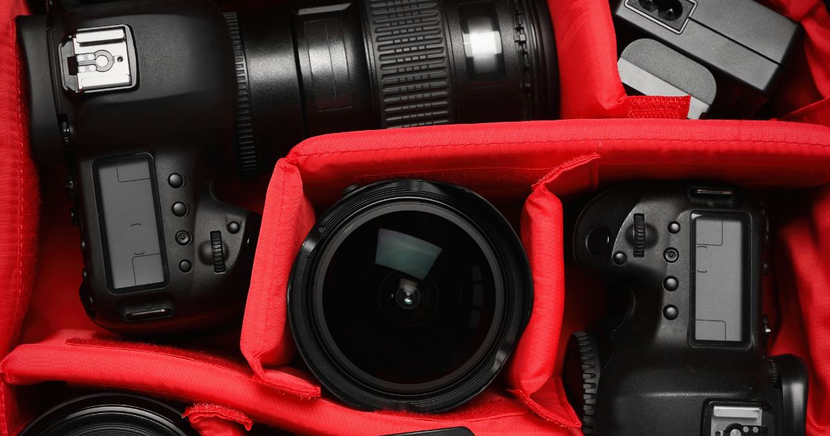 Photography For Beginners (How To Take Pictures Like A Pro) A Red Bag Filled With Various Camera Equipment For Photography Beginners.