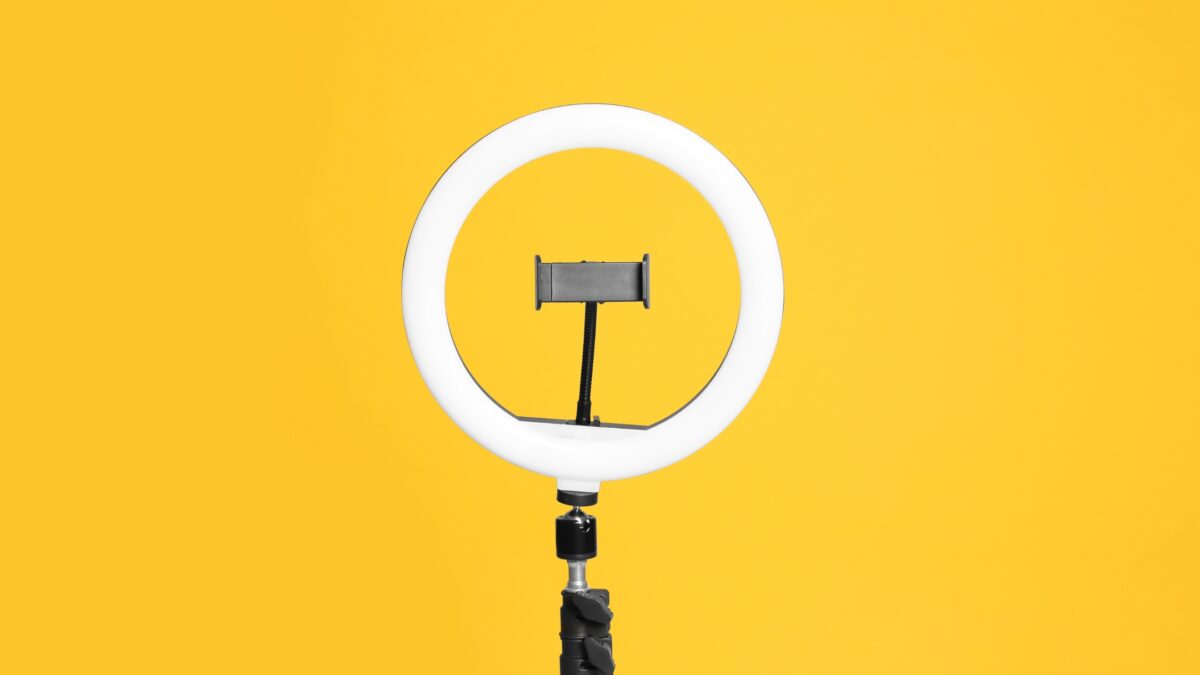 Photography Ring Light: 3 Best Choices For Content Creators A Photography Ring Light On A Yellow Background.