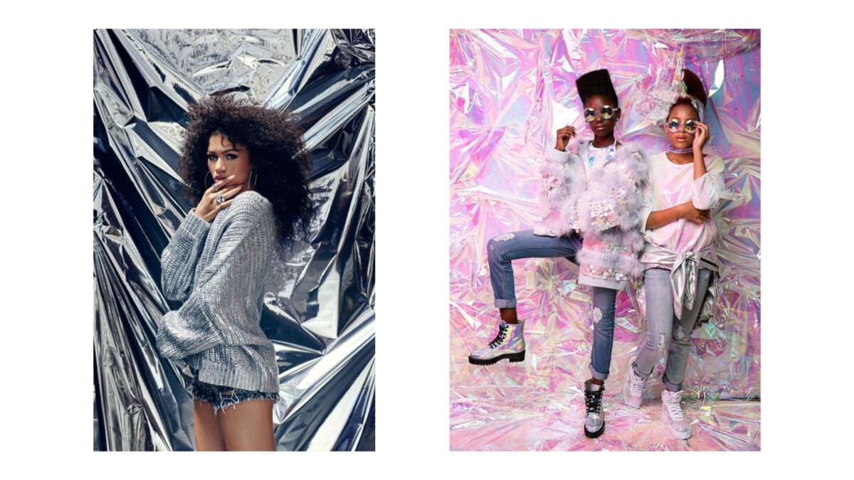 20 Cool Diy Backdrop Ideas For Your Next Photoshoot Two Women Are Striking Poses In Front Of A Visually Captivating Backdrop, Consisting Of A Sheet Of Silver Foil.