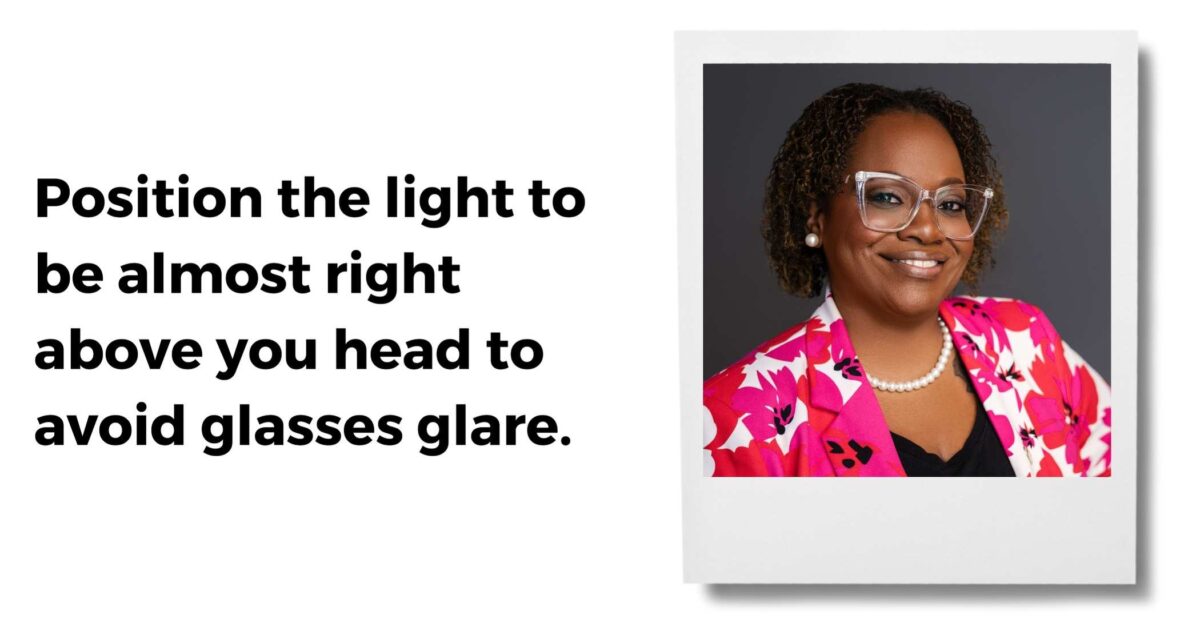 Why You Should Keep Your Headshot Photo Up To Date A Smiling Person Wearing Glasses And A Pink Floral Blazer, With Text Advising To Position Light Above One'S Head To Avoid Glasses Glare.
