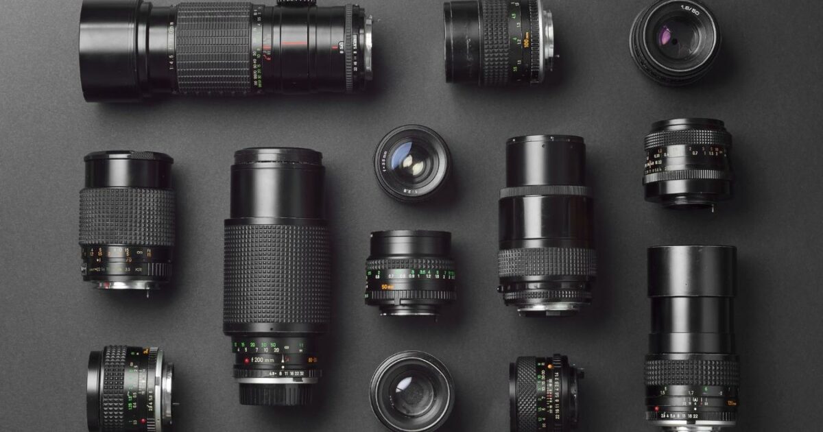 How To Choose A Camera (Simple Buying Guide For Beginners) A Group Of Camera Lenses Arranged On A Black Surface, Showcasing The Necessary Steps To Photography.
